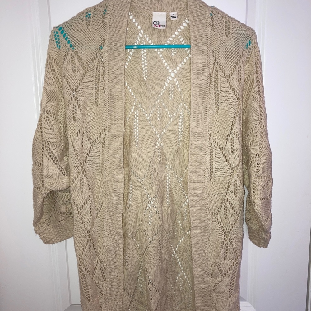 Cream cardigan, sleeves are elbow length-ish